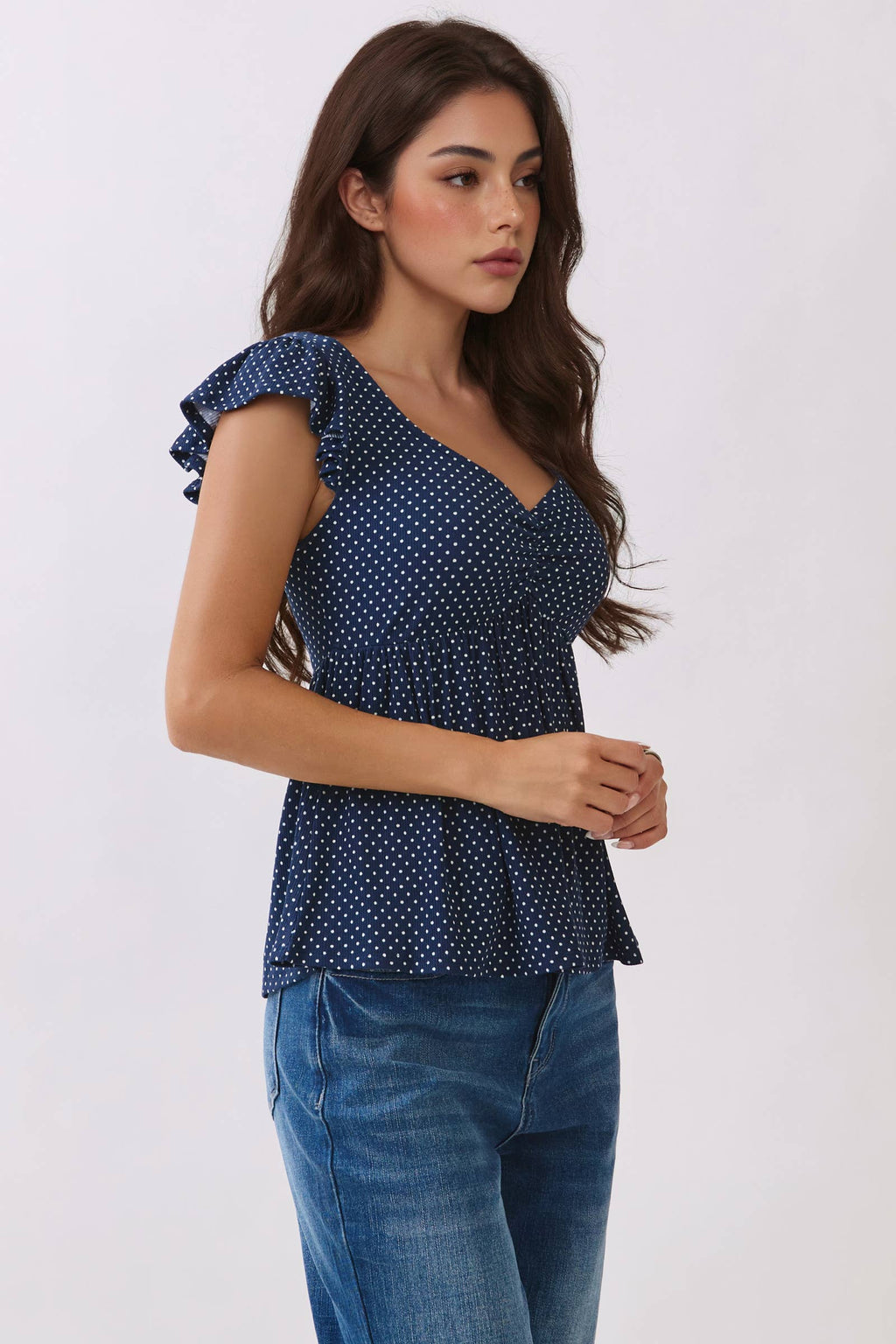 PRINTED PEPLUM TOP WITH TIE BACK DETAIL
