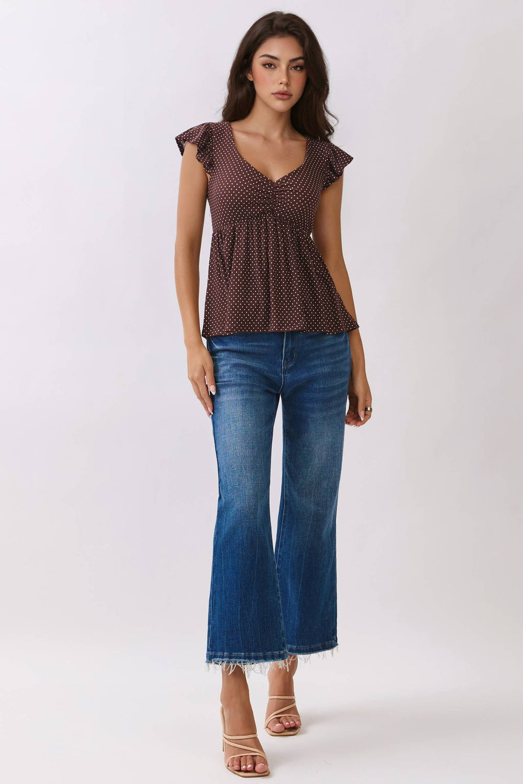PRINTED PEPLUM TOP WITH TIE BACK DETAIL